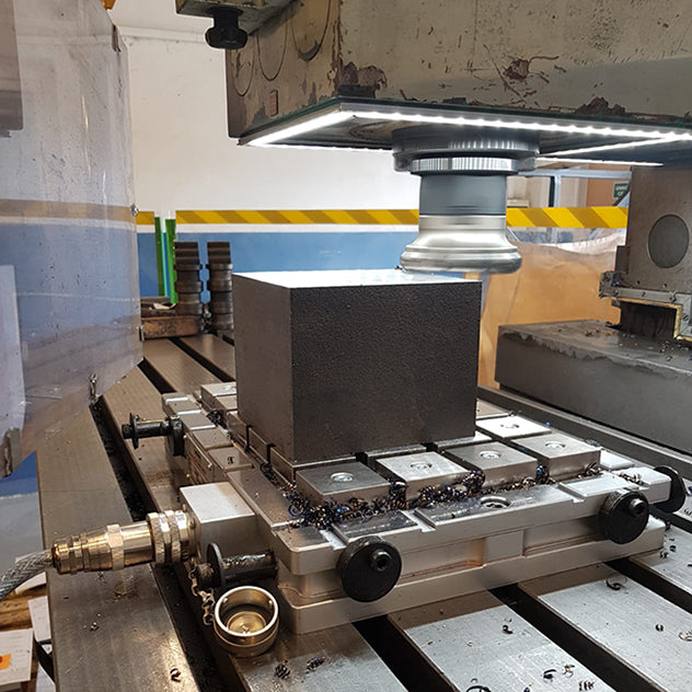 Grinding a plate held on a Magnaslot chuck